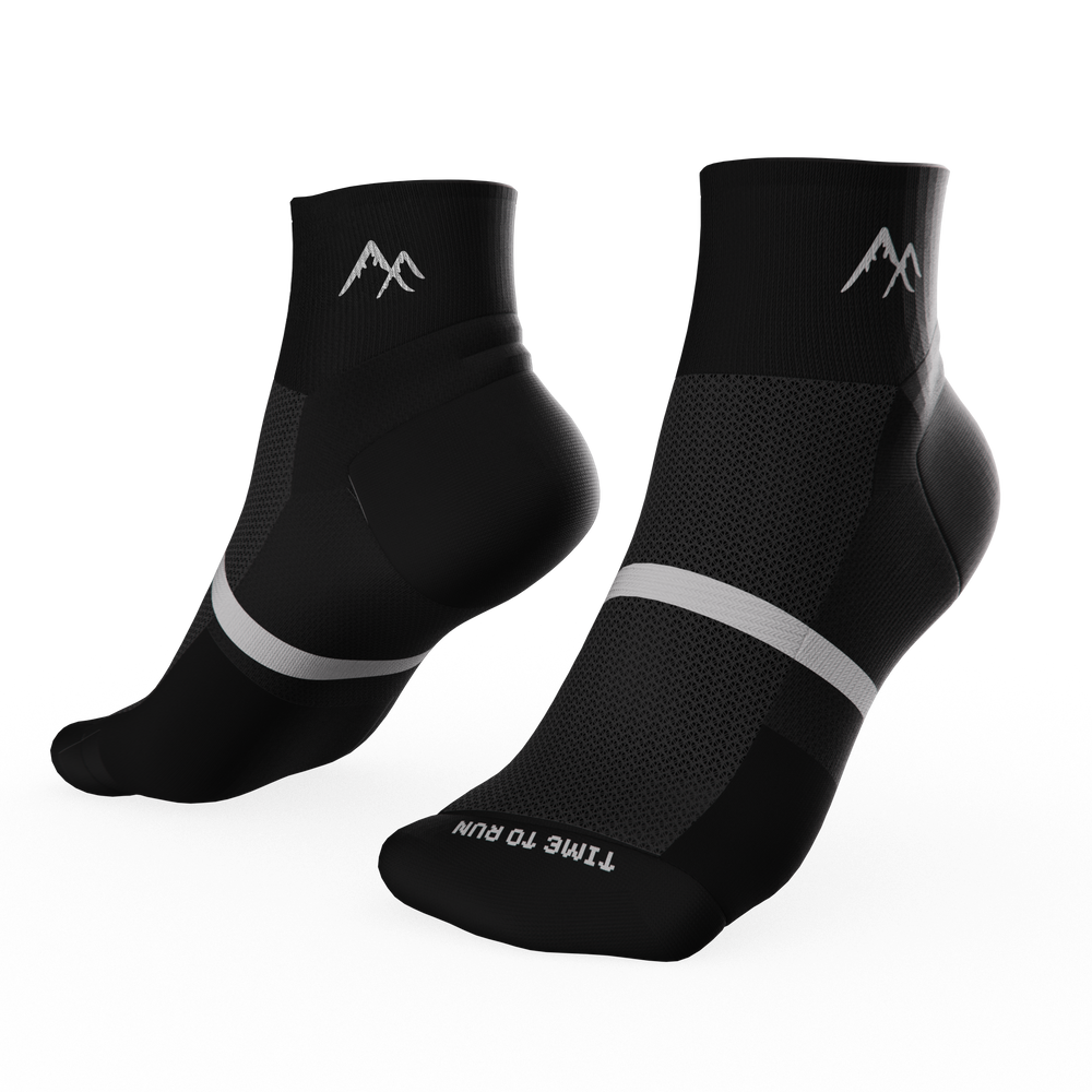 Black short crew running socks on transparent background