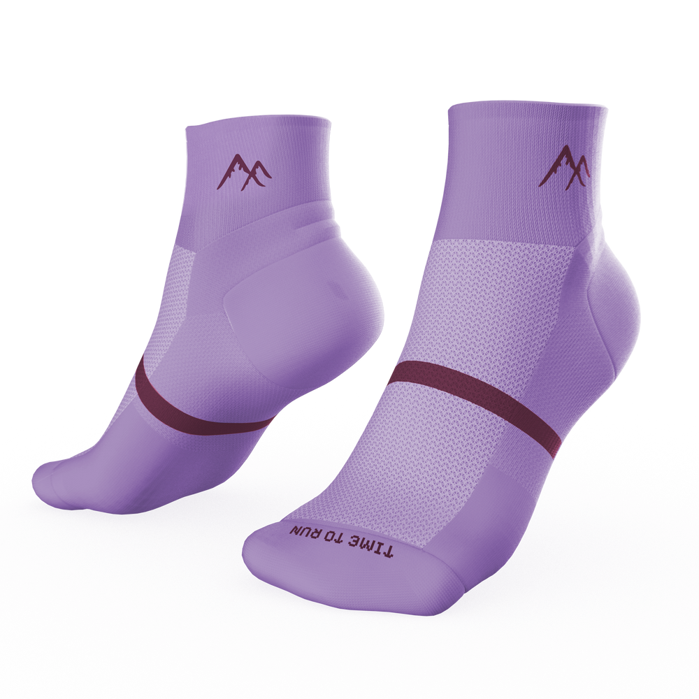 Purple short crew running socks on transparent background