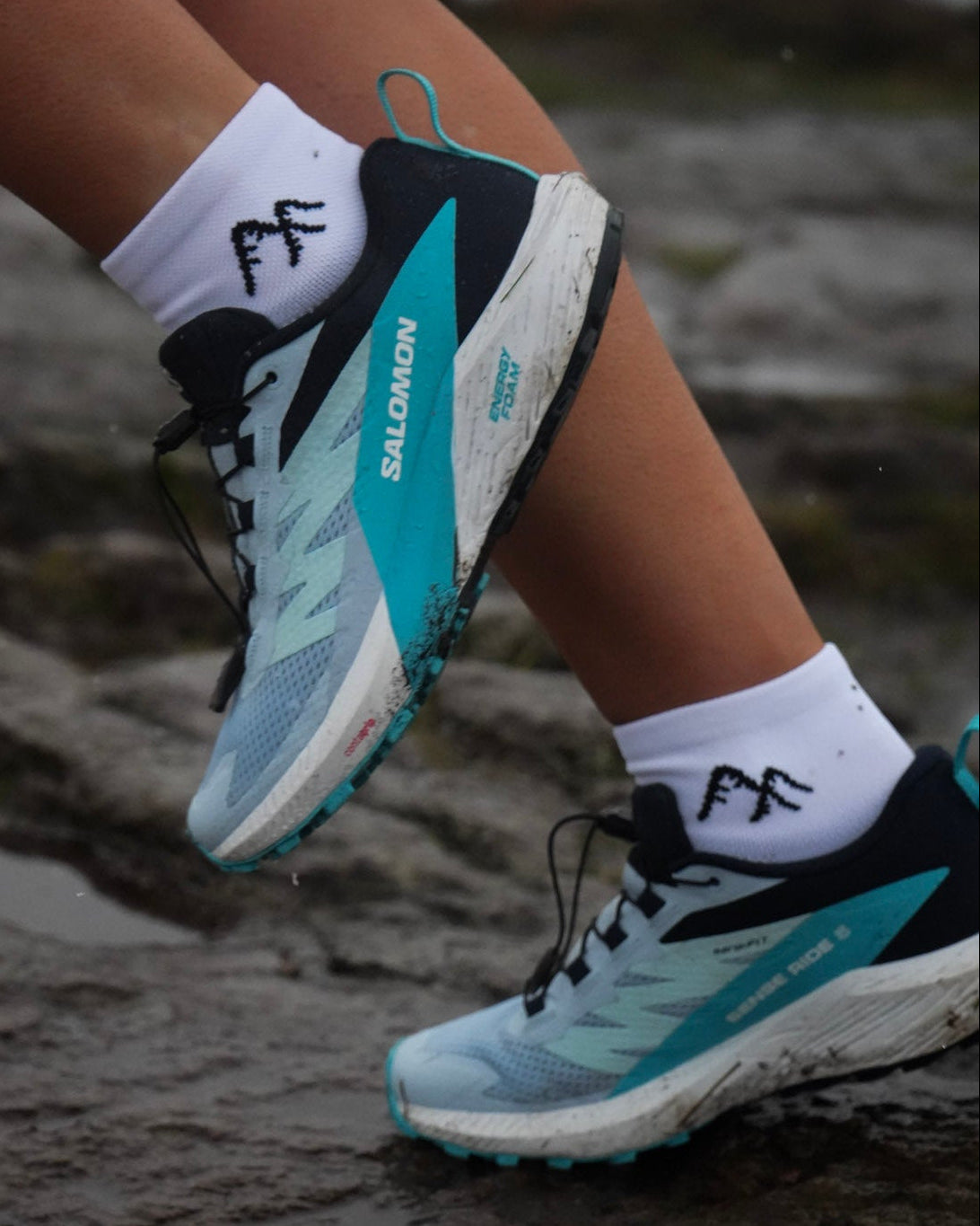 Runner wearing ArcticFit white short crew running socks